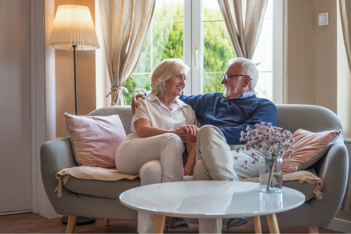 a man and woman sitting on a couch