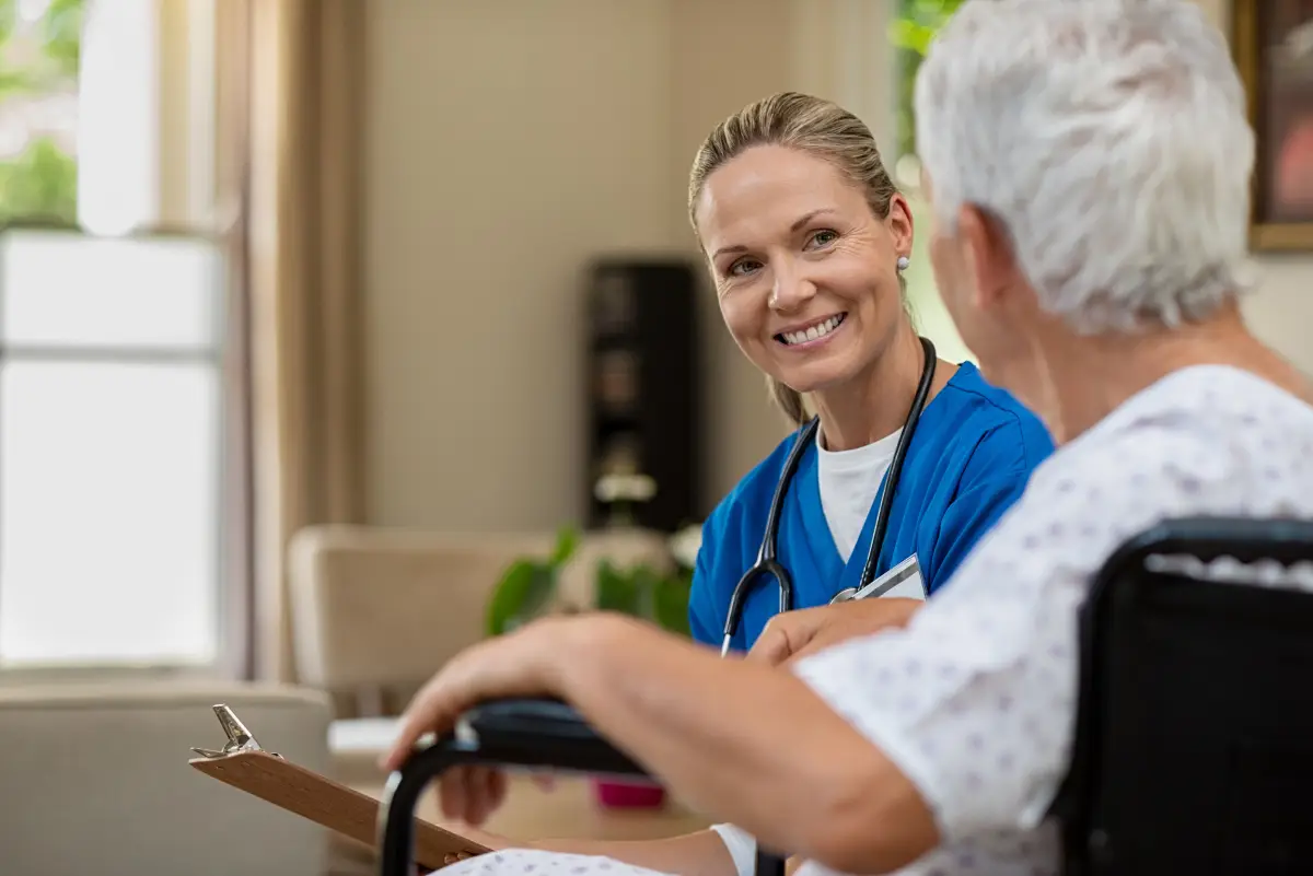 a doctor showing a patient something on the computer