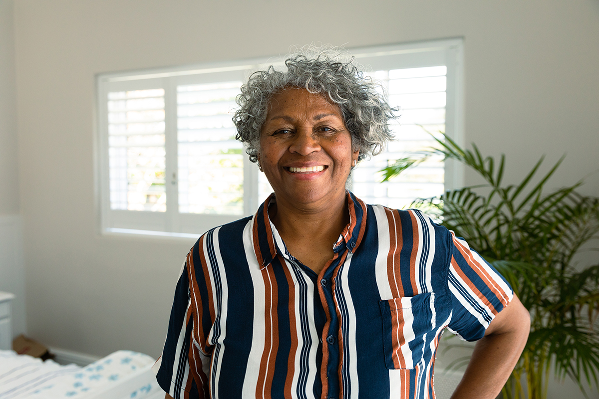 happy african american senior woman standing