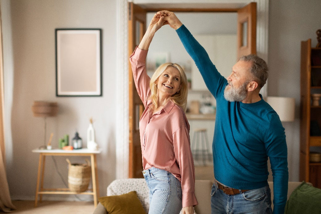 elderly couple dancing living facilities