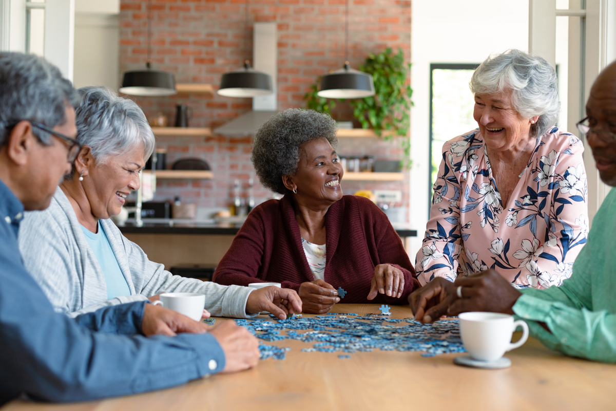 senior male and female friends in assisted living