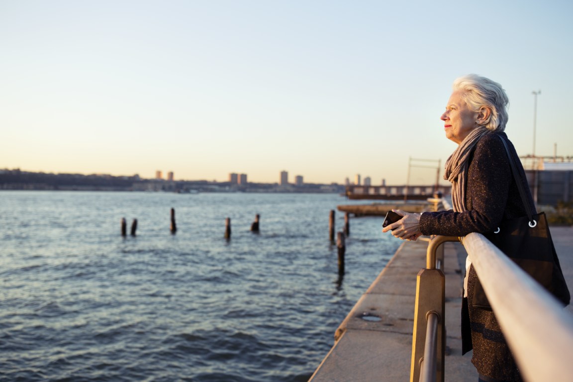 side view of senior woman leaning on railing by se 2022 05 26 04 18 32 utc